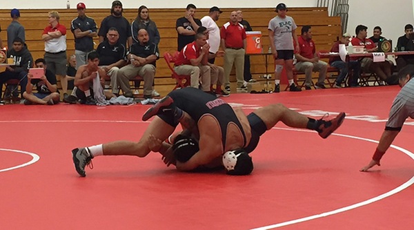BC wrestler goes for a pin 